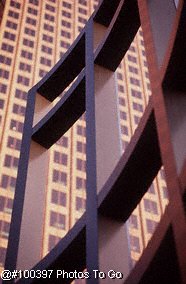 Urban sculpture w/high-rise in background